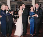 Wedding - Matt, Lori and parents dancing.JPG (30650 bytes)